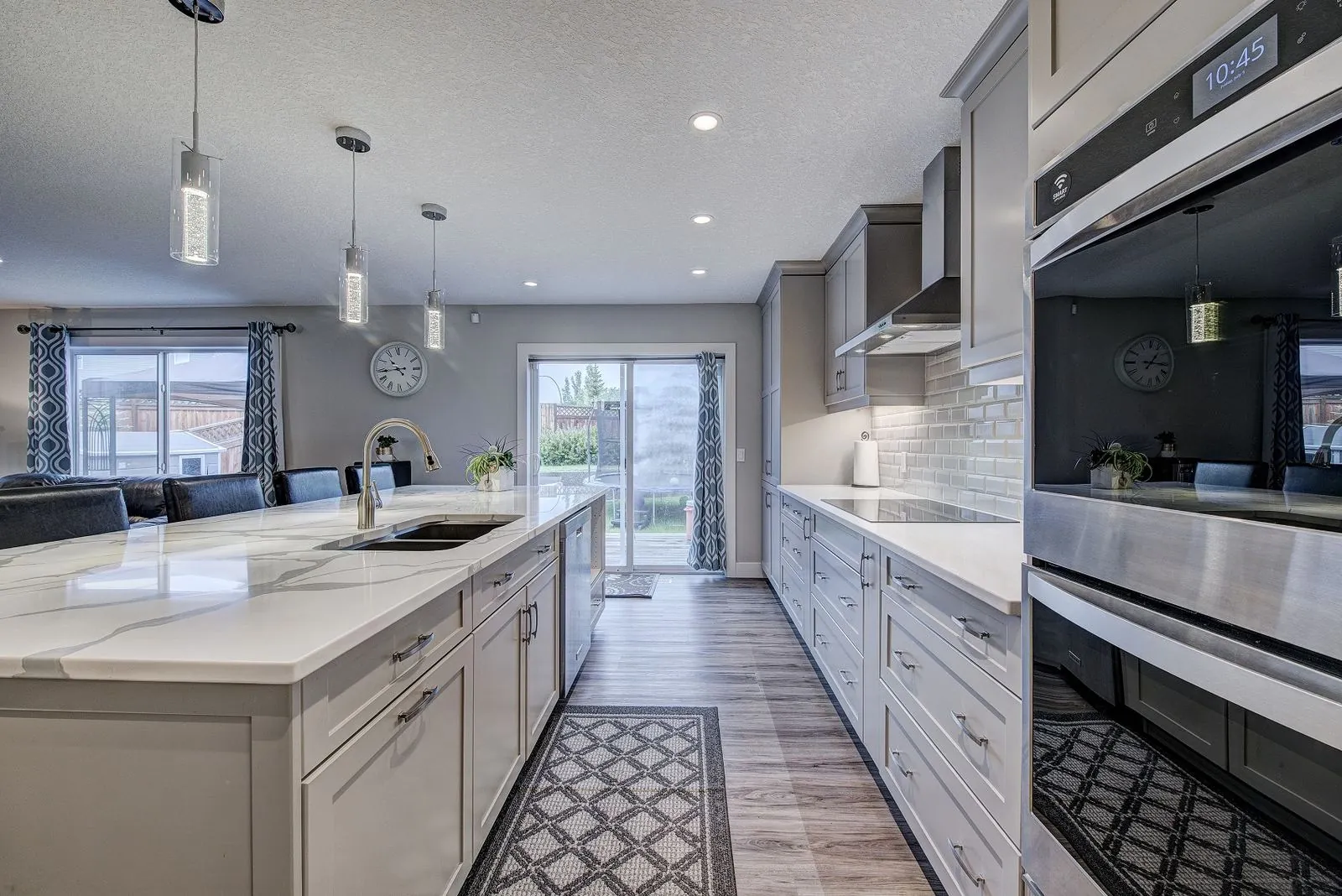 Galley kitchen with a patterned floor runner