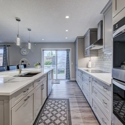 Citadel, Calgary. Galley kitchen with a patterned floor runner