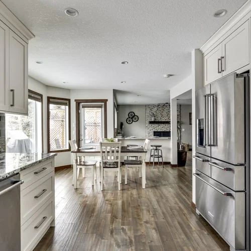 Douglas Dale, Calgary. Kitchen looking through to the dining area