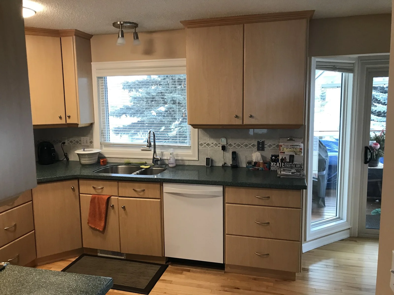 Original kitchen sink and window before renovation