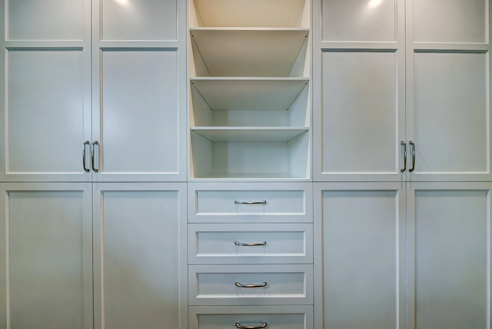 Built in wardrobe in white shaker doors with open shelving