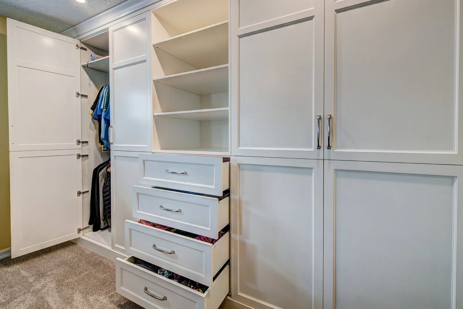 Wardrobe with the drawers and the hanging space open
