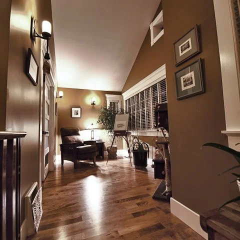 Renfrew, Calgary. Vaulted hallway in hardwood looking through to the sitting area