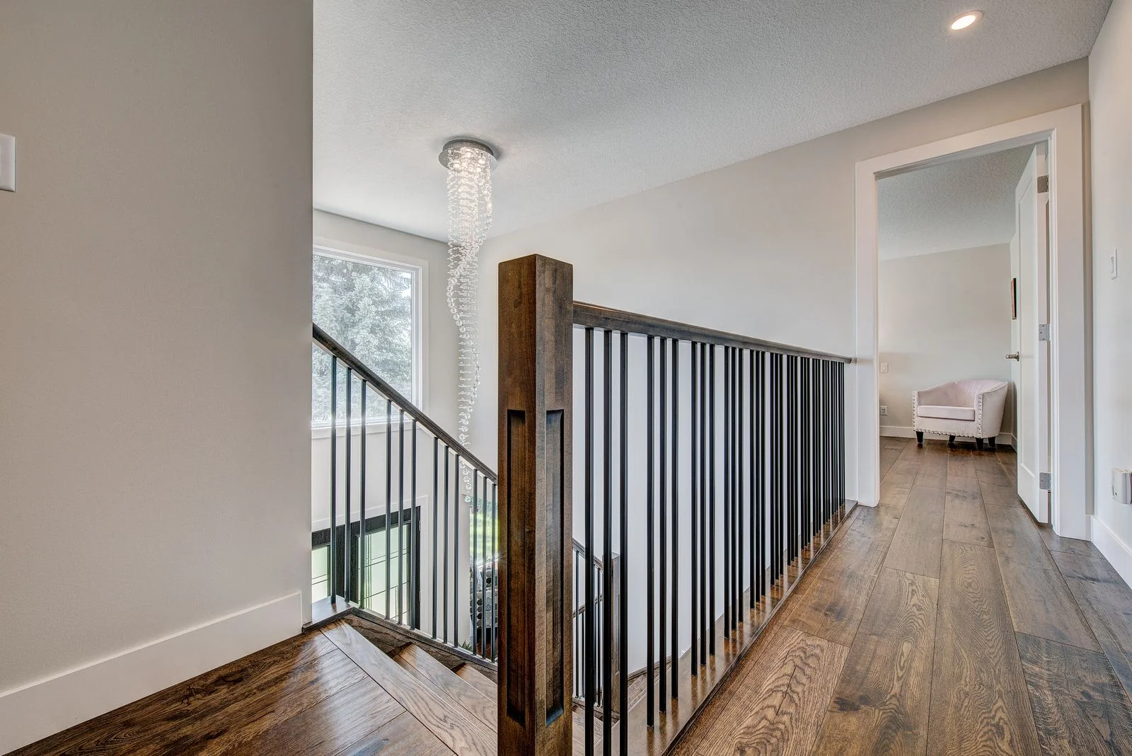 Upper hallway with an open rail